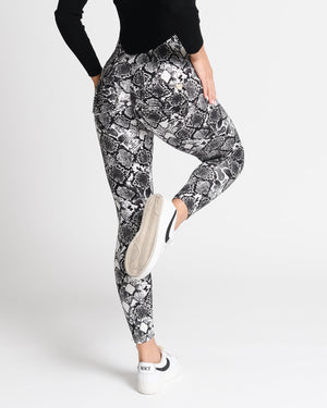 Model showing the back of black *Wild at Heart* (Dream Light Leggings)