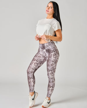 Full view of woman wearing *Wild at Heart* (Dream Light Leggings)