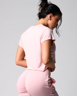 Side view of the pink *The Flutter Tee* (Perfect Pocket Tee)