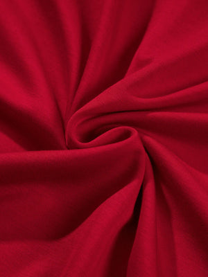 Close-up of red fabric with folds