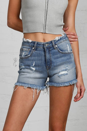 Close up view of MID-RISE DISTRESSED SHORTS