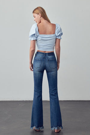 Back of HIGH RISE SKINNY BOOT FLARE JEANS