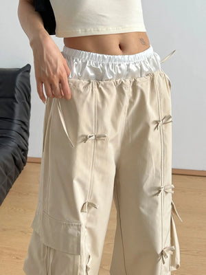 Beige cargo pants worn by a person with a neutral background