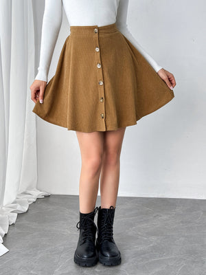 Model showing pleats on Buttoned Mini Skirt