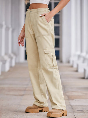 Person wearing beige cargo pants with a blurred background