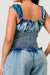 Close up back view of Chambray Charm Ruffled Jumpsuit