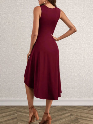 Burgundy dress worn by a person on a neutral background