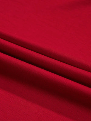Close-up of red fabric with folds