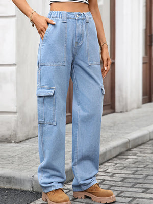 Person wearing light blue cargo pants on a street.