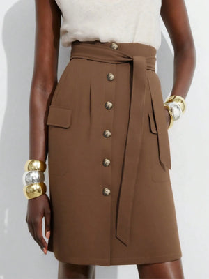 Brown button-up skirt worn by a model on a white background