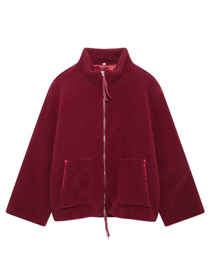 Red fleece jacket on a white background