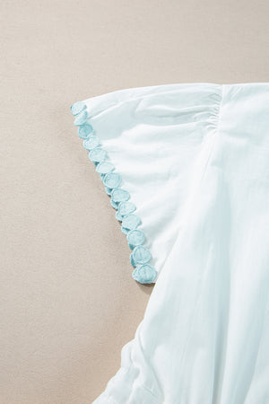 View of sleeve on Contrast Trim Button Up Short Sleeve Dress