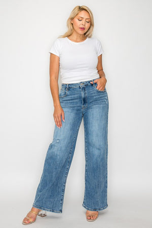 Model showing pocket on plus size bytos Full Size High Rise Wide Leg Jeans with Pockets