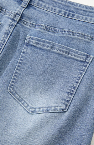 close up view of back pocket on Distressed Raw Hem Heart Denim Skirt