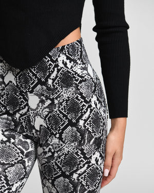 Left side view of black *Wild at Heart* (Dream Light Leggings)