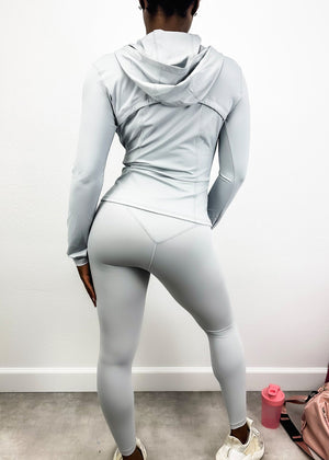 Gray Three-Piece Hooded Zip Jacket, Sports Bra, and High-Rise Leggings Set
