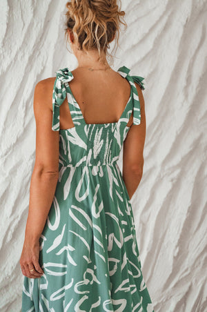 Back view of green Mia Vita Button Down Dress With Ties