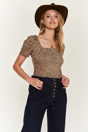 Model showing pockets of HIGH WAISTED BUTTON WIDE LEG JEANS