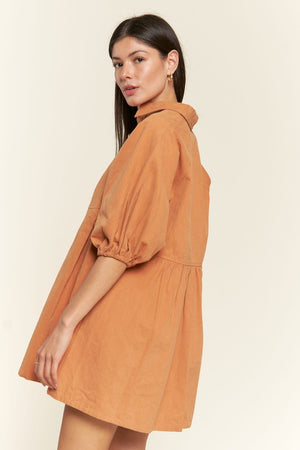 Side view of Washed denim style dress