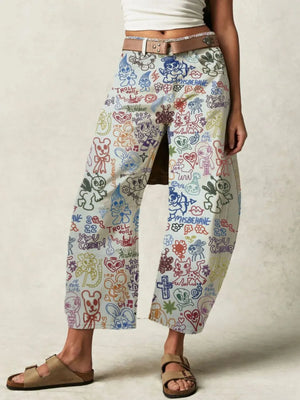 Colorful patterned pants worn by a person on a plain background