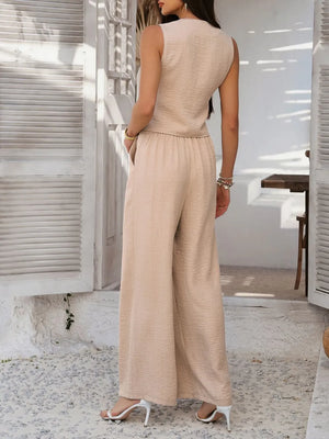 Woman wearing a beige jumpsuit in an outdoor setting
