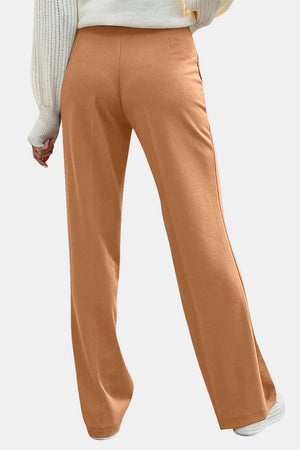 Back view of beige Decorative Button High Rise Pants