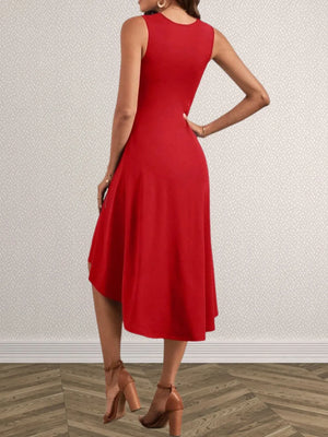 Red dress worn by a person on a plain background