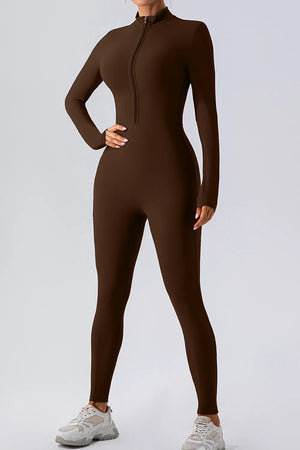 Brown bodysuit worn by a person on a light gray background
