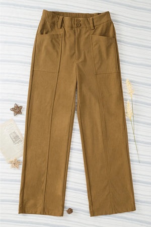 Brown pants on a textured white background