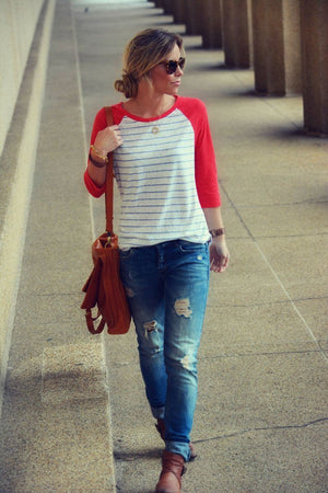 Woman walking down the sidewalk with Mi Vida Foldover Tote on her shoulder