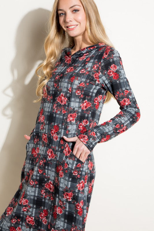 Side view of model showing pockets of FLORAL PLAID PRINT SIDE POCKET HOODIE MINI DRESS