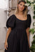 close up of Cherie Puff Sleeve Midi dress-black