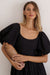 top view of Cherie Puff Sleeve Midi dress-black