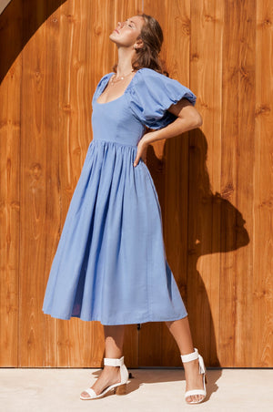 Full left side view of Cherie Puff Sleeve Midi dress- caribbean blue