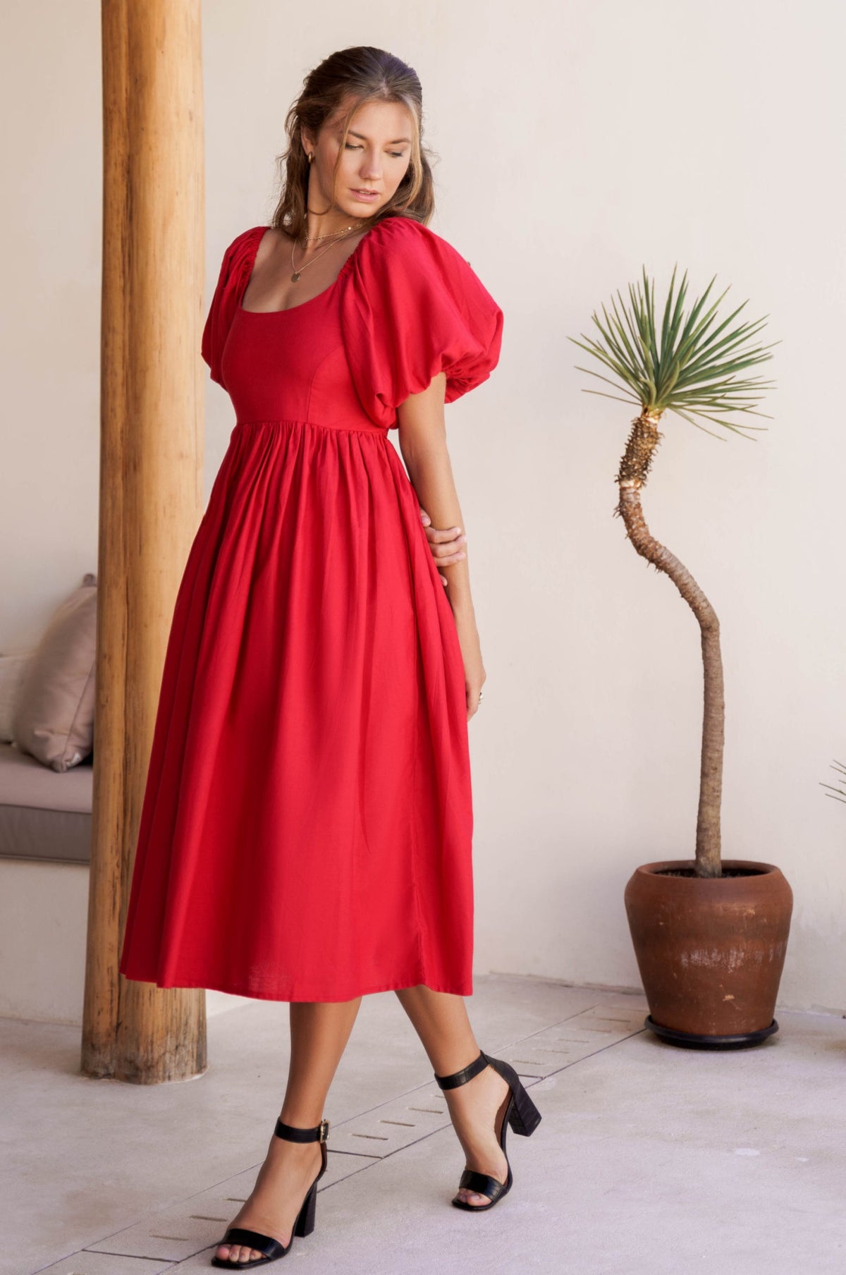 Left side view of Cherie Puff Sleeve Midi dress-red