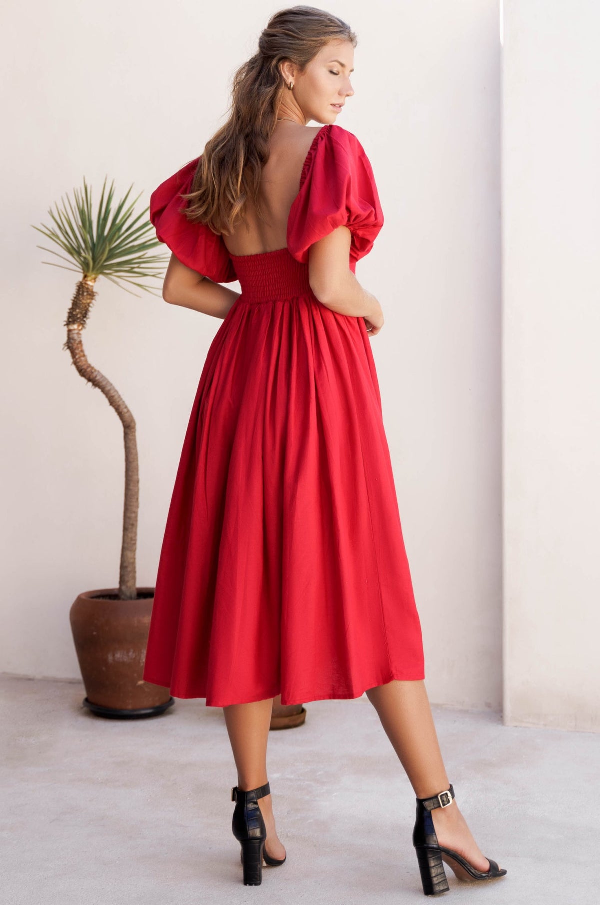 Back view of Cherie Puff Sleeve Midi  dress-red