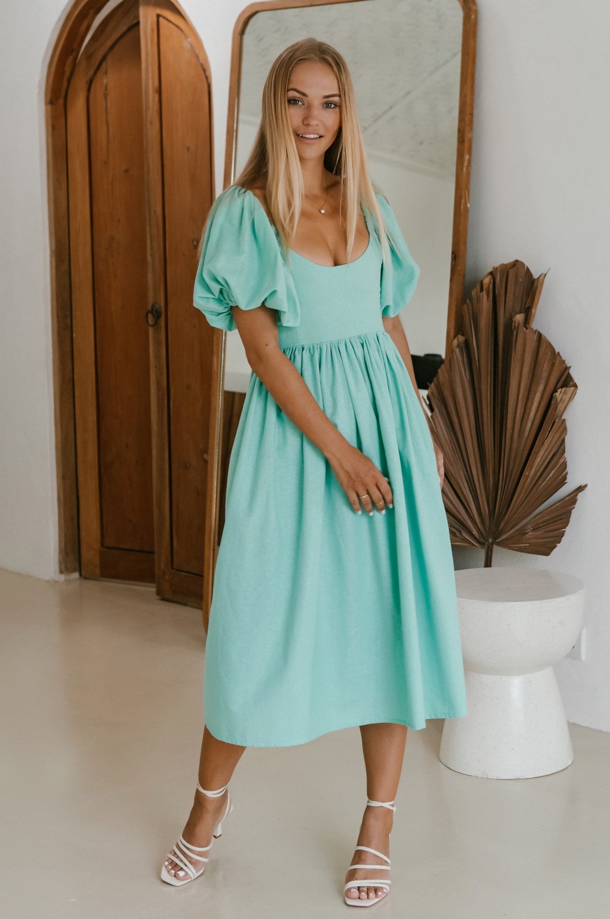 Side view of Back of Cherie Puff Sleeve Midi dress- tosca