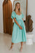 Side view of Back of Cherie Puff Sleeve Midi dress- tosca