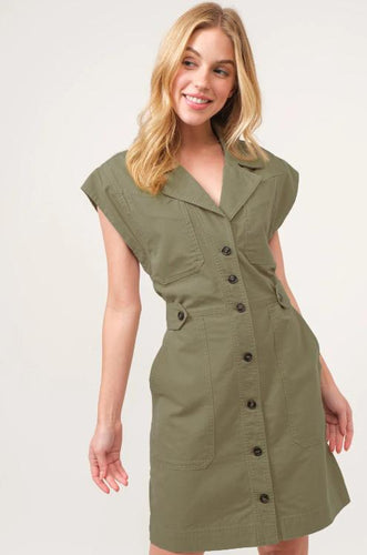 A woman wearing a casual dress. 