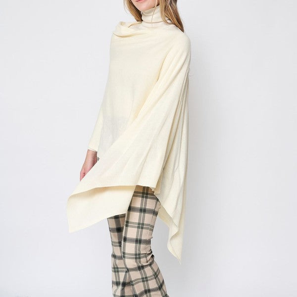 Woman wearing a white poncho