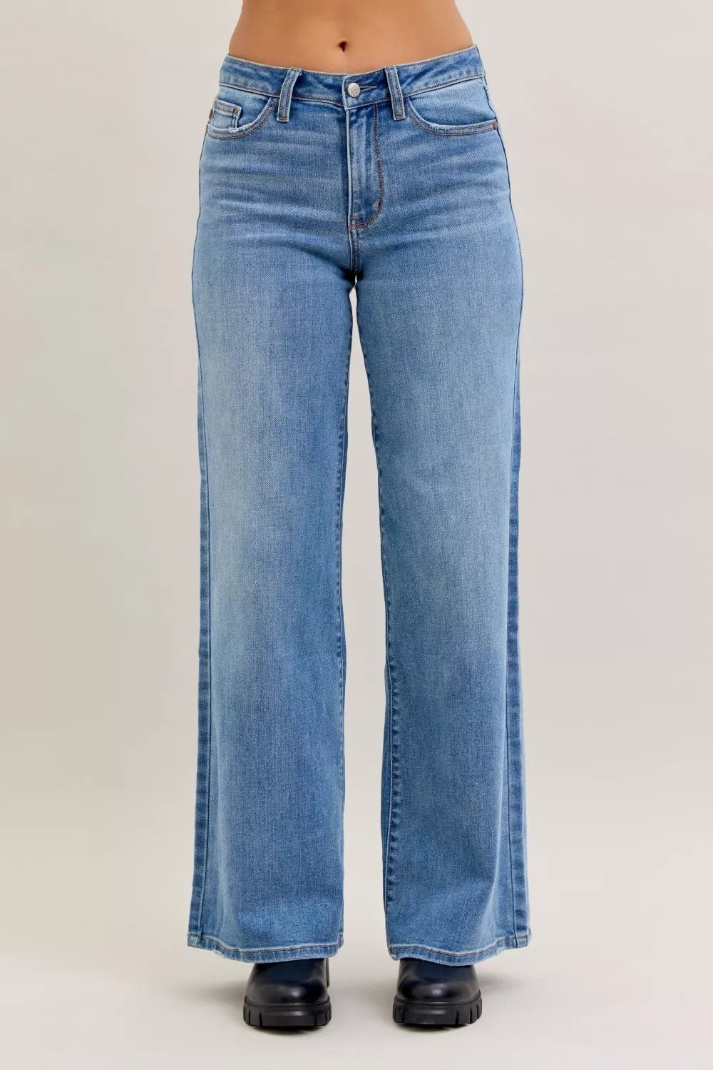 Woman wearing Judy Blue high waist wide leg jeans