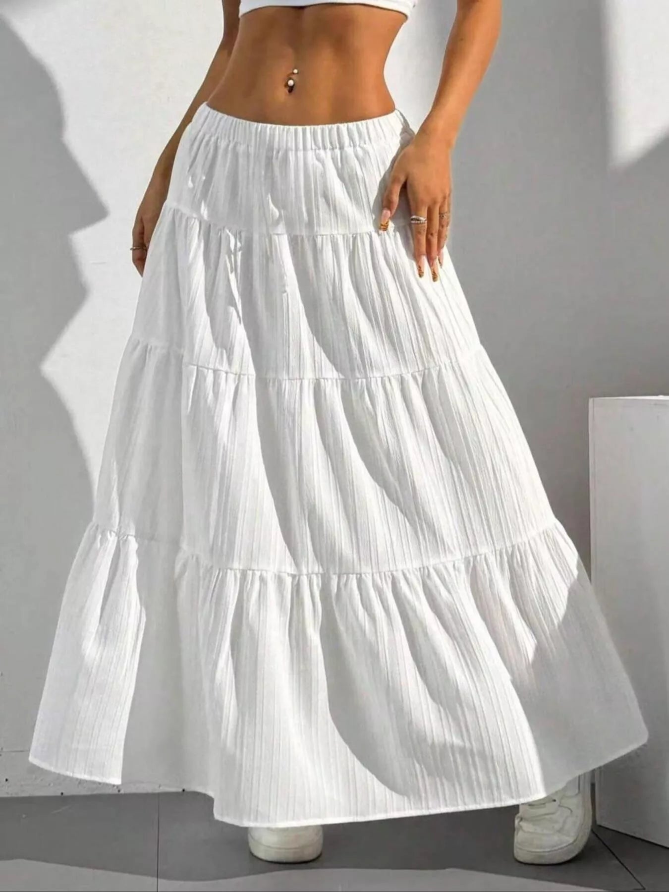 woman wearing long white skirt