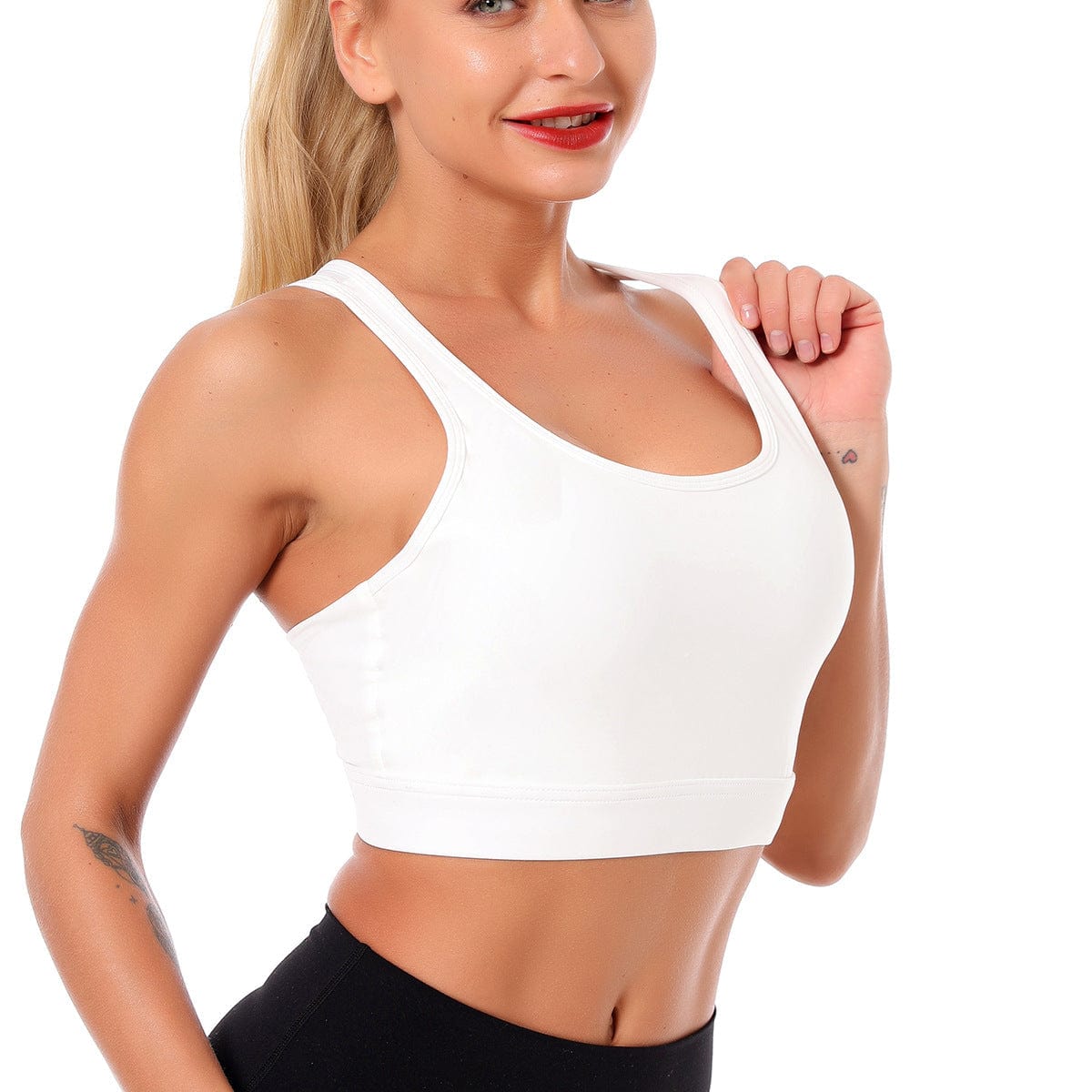 Woman wearing a white sports bra