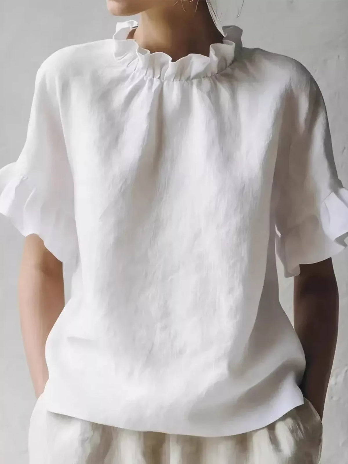 Woman wearing a plus size top