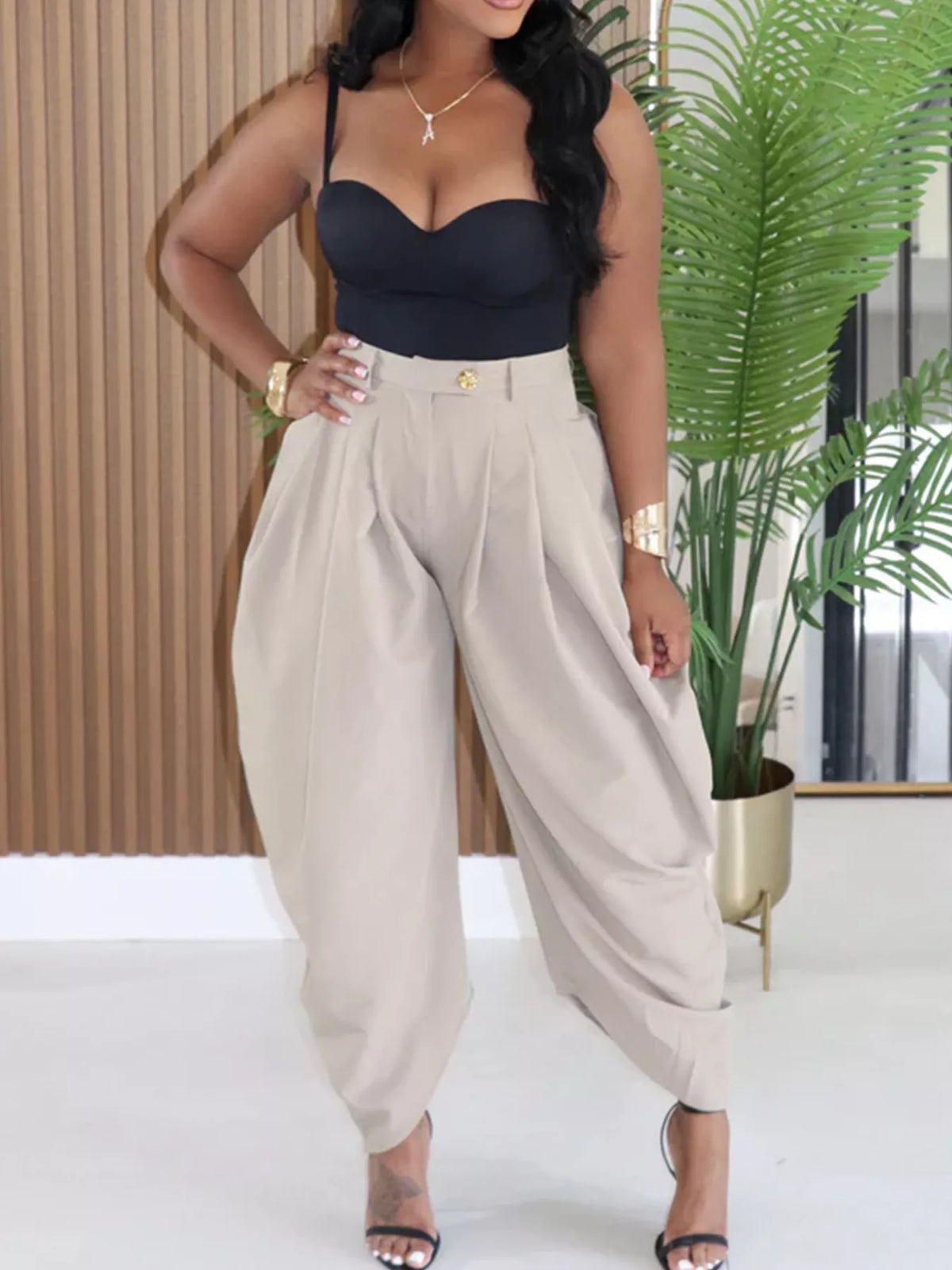 Woman wearing beige stylish pants 