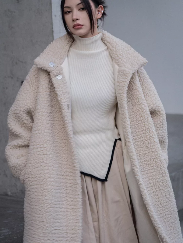 Women wearing a plush teddy bear coat