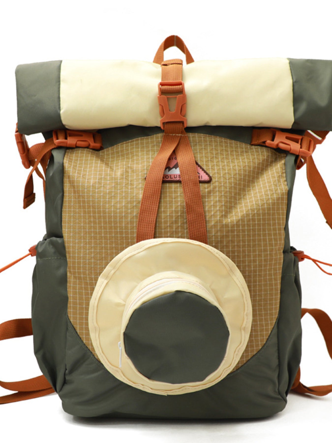Backpack with roll-top design and circular front pocket on a white background