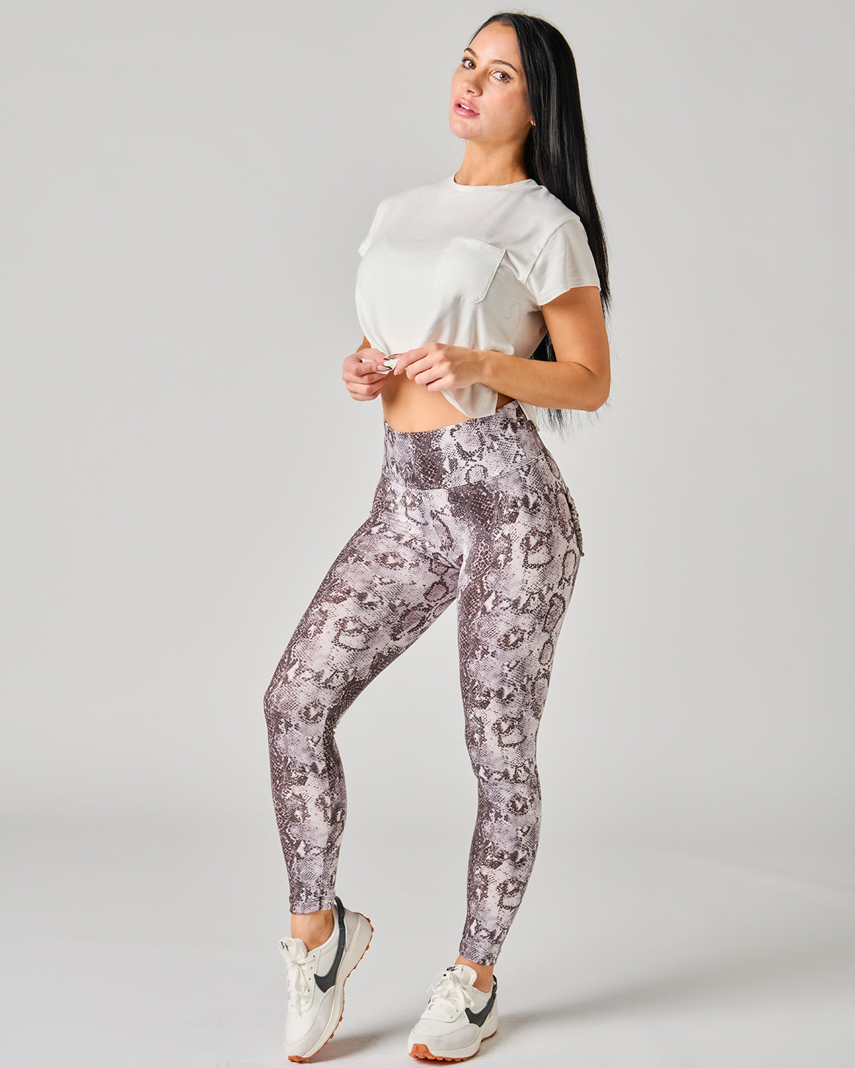 Full view of woman wearing *Wild at Heart* (Dream Light Leggings)