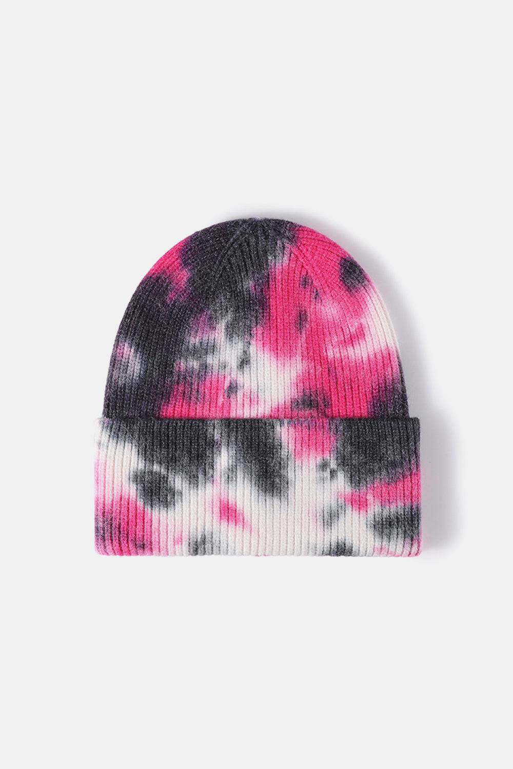 Tie-dye beanie with pink and black patterns on a white background