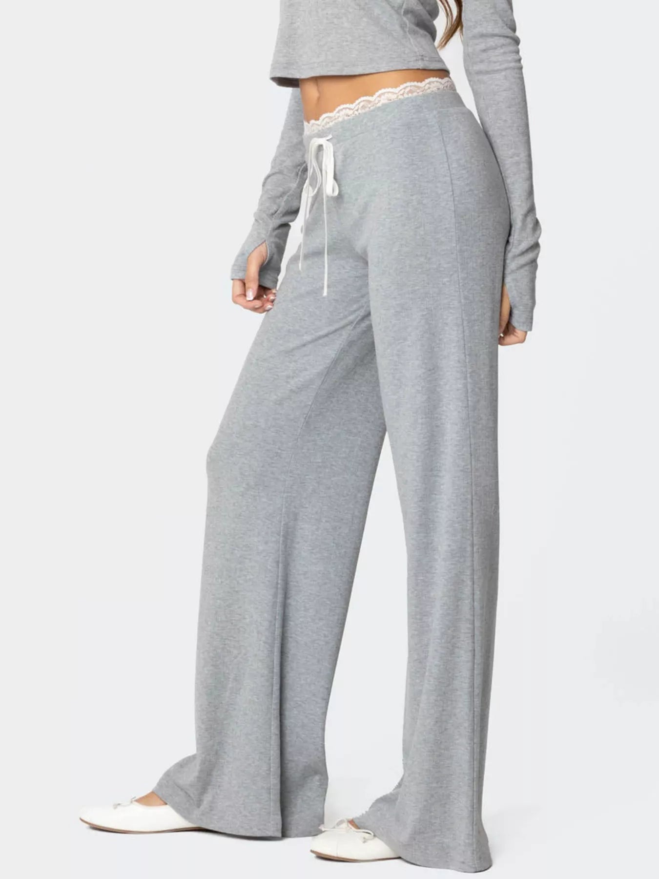Gray lounge set with wide-leg pants and long-sleeve top on a white background